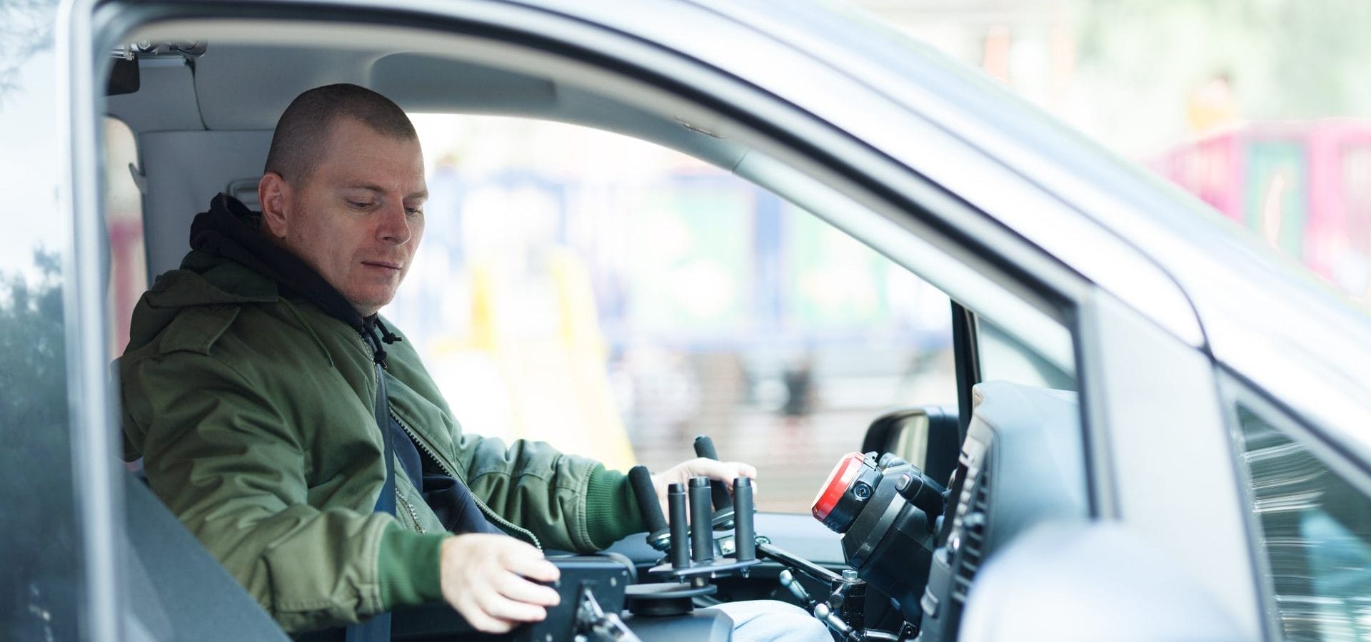 Disabled driver using adaptive steering.