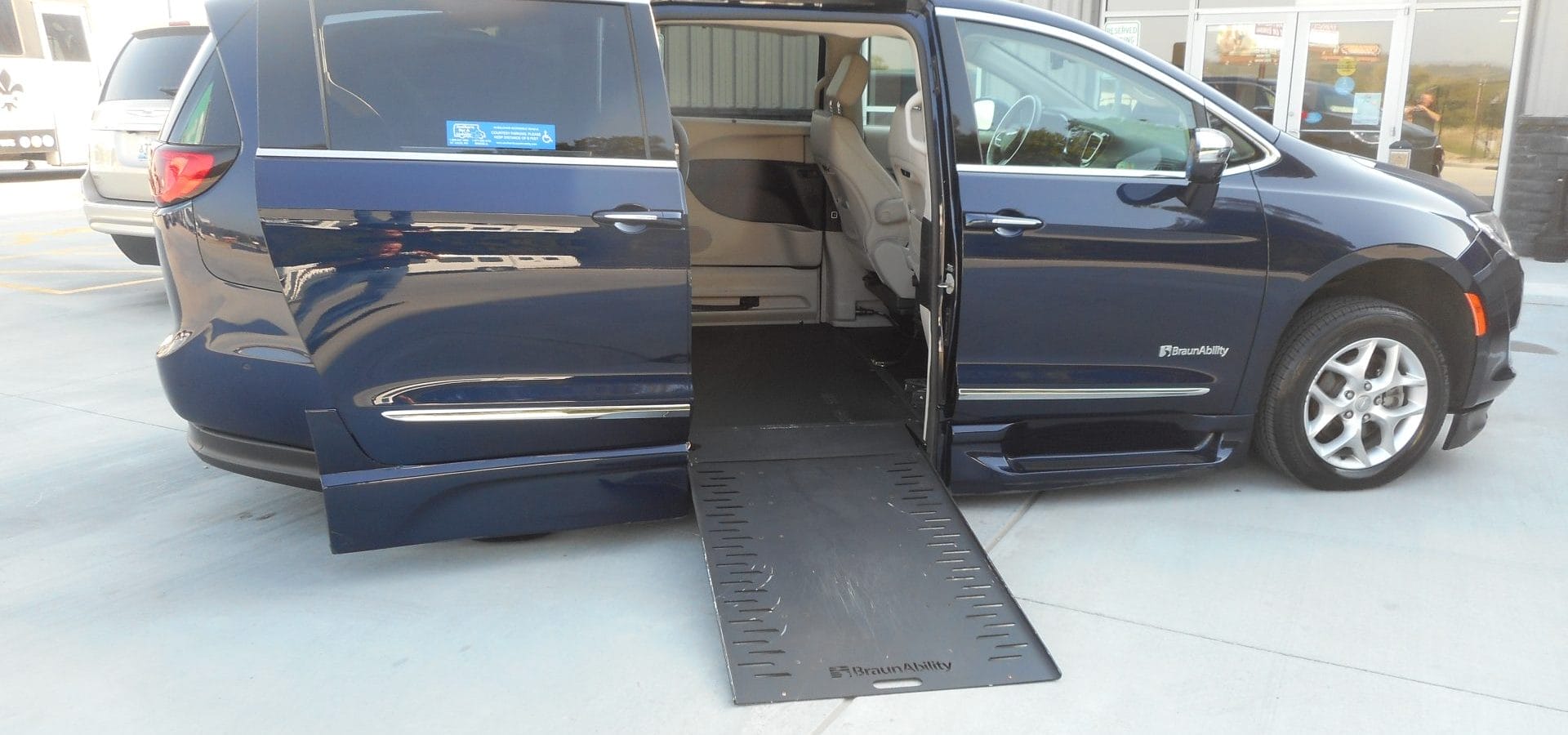 Side view of 2020 Chrysler Pacifica Limited BraunAbility Xi Power Infloor Ramp.